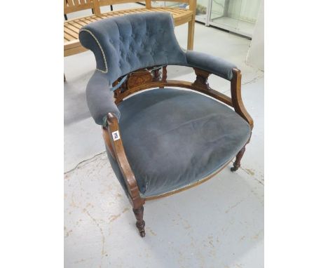 A Victorian mahogany button back tub chair 