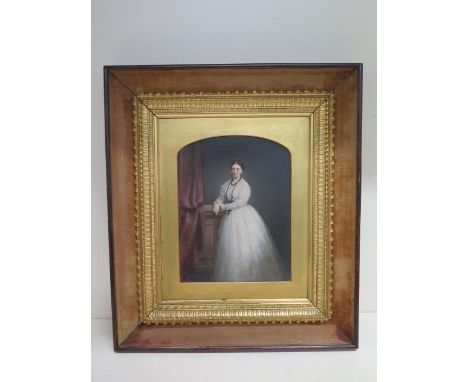 A 19th century portrait of a lady oil on canvas in ornate gilt frame and mounted in a rosewood frame - external frame approx 