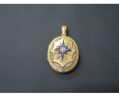 A Victorian 14ct yellow gold (unmarked but tested) lock with pearls and blue enamel, finely chased, oval shaped approx 4cm x 