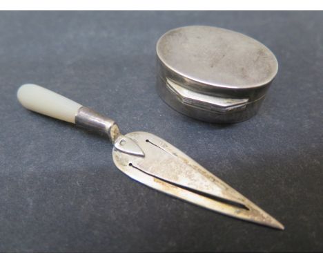 A Georgian silver pill box Birmingham, with gilt interior, oval shape, approx 3cm together with a silver page marker in the s