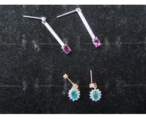 Two pairs of 9ct gold earrings with ruby and emerald - weight approx 3.7 grams - 9ct white gold drops with ruby approx 3cm 