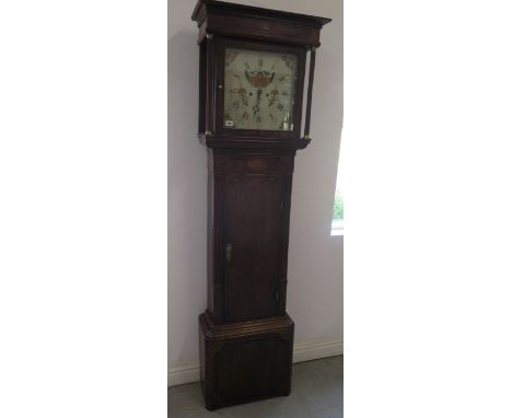 An 8 day longcase clock in an oak and mahogany crossbanded case with a painted dial with lunar moon, possible Welsh maker, ca