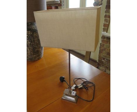 A chromium plated table lamp with shade 