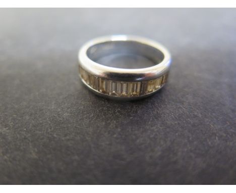 A hallmarked 18ct white gold and diamond half eternity ring size K/L - in good condition 