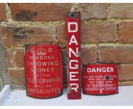 Three original red enamel telegraph pole signs 