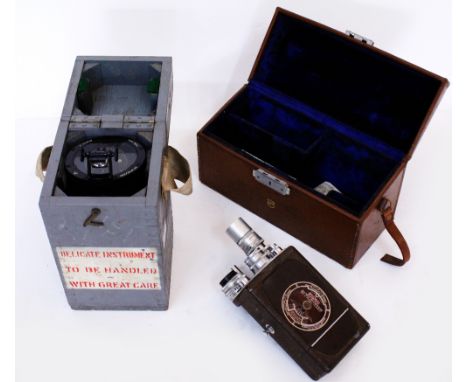 A BELL & HOWELL COMPANY FILMO AUTO MASTER CINE CAMERA with various lenses and original case together with a wooden cased ship