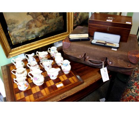 A VICTORIAN TEA CADDY,  a Parker pen and a Parker pencil, a Swan pen, Royal Worcester porcelain miniature jugs, a marquetry i