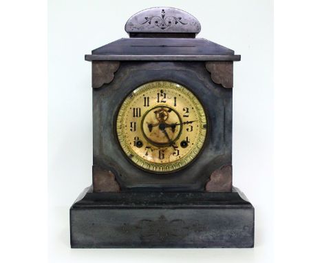 A LATE 19TH CENTURY SLATE MANTLE CLOCK the brass dial with Arabic numerals, 14.5cm diameter x overall 36cm high