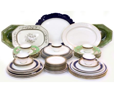 A SET OF TWELVE COPELAND LIGHT GREEN GROUND DESSERT PLATES decorated with flowers and gilt borders 23cm diameter together wit