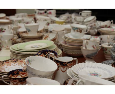 A LARGE QUANTITY OF EARLY 20TH CENTURY AND LATER PORCELAIN TEA WARES to include Colclough, Duchess, Wedgwood, Royal Tuscan an