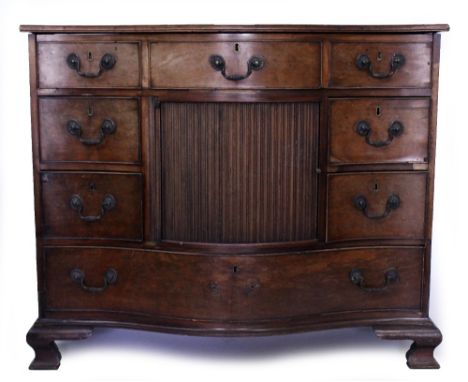 A GEORGIAN STYLE MAHOGANY SERPENTINE SIDE CABINET with various drawers around a louvered cabinet, and on shaped bracket feet,