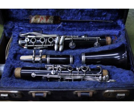 A CASED BOOSEY & HAWKES OF LONDON CLARINET 'REGENT' with some accessories 