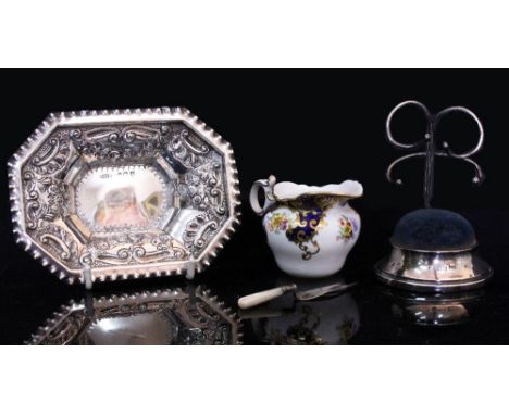 A 'TROWEL' SILVER BOOKMARK with mother of pearl handle and silver hat pin stand, a silver bon-bon dish and a small ceramic ju