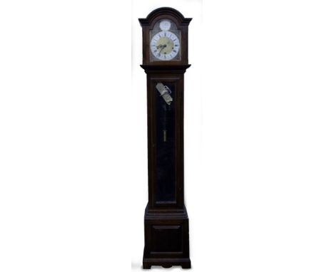 A 20TH CENTURY TEMPUS FLIGHT LONGCASE CLOCK  with brass dial with applied brass spandrels above a glazed door and further pan