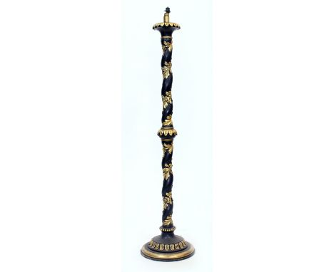 A BLACK PAINTED PARCEL GILT LAMP STANDARD with spiraling column and circular spreading base, 138cm high