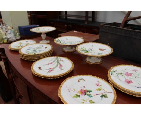 A VICTORIAN PART TEA SERVICE with botanical pattern and registration kite number to the reverse, to include cake stands, cabi