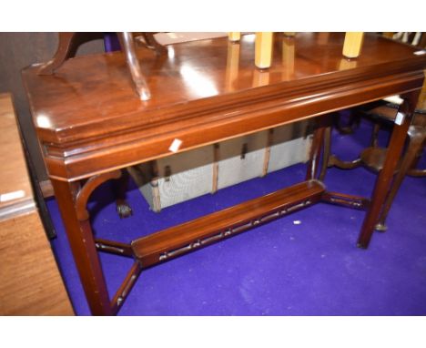 A reproduction hardwood console table, approx. 110cm width