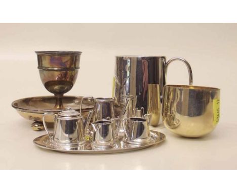 Small silver christening mug, miniature tea service, silver lid and egg cup. Condition report: see terms and conditions.