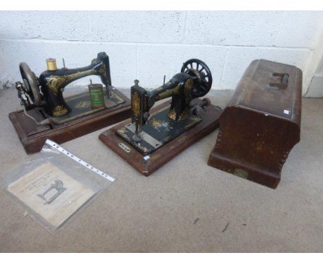 A Singer sewing machine with instruction manual for the 27K and 28K, and a cased Jones C.S. sewing machine.