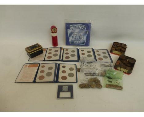 An assortment of English coinage including six sets of  Britain's First Decimal Coins and a tube of uncirculated 1967 pennies