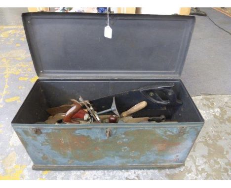 A metal tool chest with an assortment of tools including a Stanley Plane No. 4, G clamps, saws, files etc.