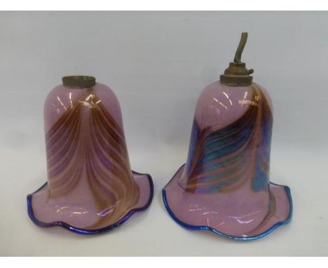 A pair of tulip shaped lustre glass lamp shades.