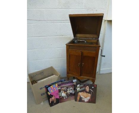 A 1930s light oak Lissenola wind-up floor standing gramophone, raised on barley twist supports with X stretcher. Also an asso
