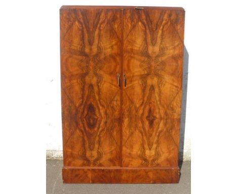 An Art Deco walnut compactum, with internal retail label - Compactum Showrooms, 143 Regent Street, London W1.