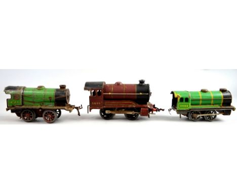 Hornby 0 gauge type 501 5600 Locomotive in burgundy together with a Chad Valley clock work loco and another similar(3)