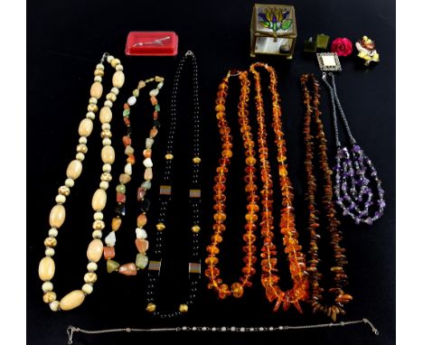 Group of Costume on silver jewellery including amber, haematite and amethyst necklaces, and a gold cased watch on plated stra