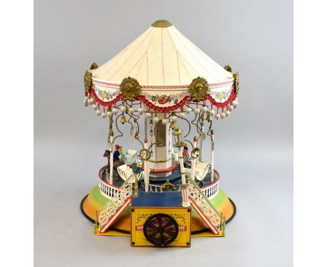 Marklin 16121 Carousel: reproduction (limited edition of 2000)  of the 1908 Marklin 8847 carousel model consists of manual cr