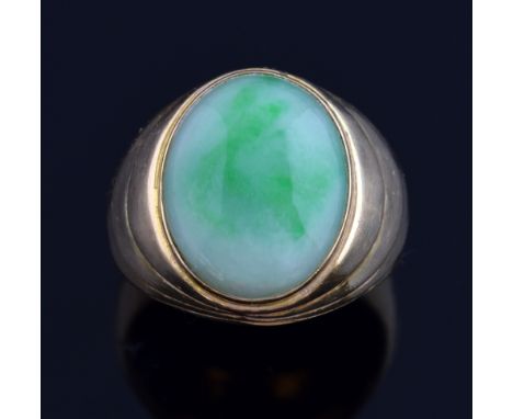  Vintage jade and gold signet ring, oval cabochon cut jade measuring 16 x 12mm with a gold surround, stamped 585 for 14ct, ri