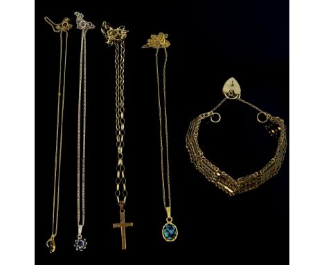 Group of gold jewellery  including a gate link bracelet with heart clasp, wedding band cross pendant, and three gem set penda