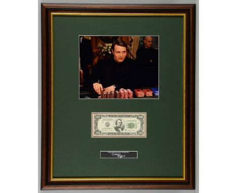 James Bond Casino Royale (2006) - Prop banknote & autograph still, framed inside a mount with a descriptive plaque & a photog