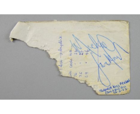 Michael Jackson (1958-2009) American Singer / Songwriter, a clear biro autograph on the reverse of London A-Z, 3.5 x 3 inches