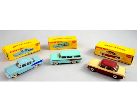 Dinky Toys diecast Humber Hawk No 165 in maroon and cream, Nash Rambler No 173 in turquoise blue body, red stripe, grey hubs,