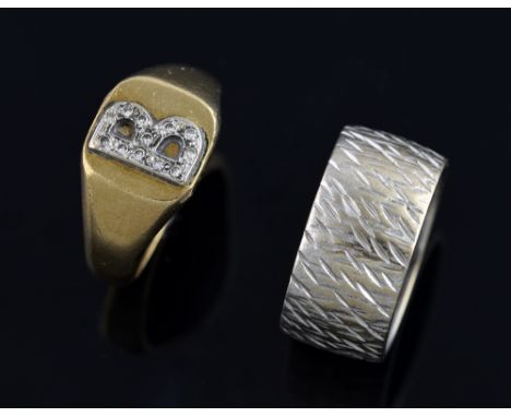 White gold wedding band with textured finish, 18 ct  London hallmarks, 1971, ring size J, and a yellow gold signet ring with 