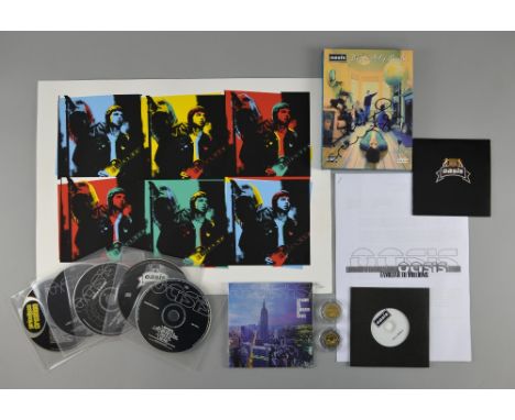Oasis - Signed by Noel Gallagher ‘Definitely Maybe’ 2 DVD 2004 set, ‘Columbia’ 2004 promo CD, ‘The Masterplan’ 4 track promo 