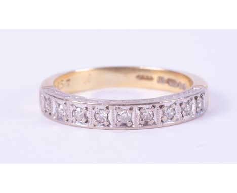 An 18ct yellow gold &amp; platinum half eternity ring set with nine small round diamonds, total diamond weight approx. 0.09 c