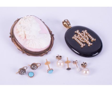 A mixed lot with a gold edged (not hallmarked or tested) cameo brooch with safety chain, 5cm x 4cm, 31.44gm, a gold (not hall