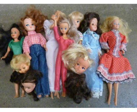 Seven dolls including Mattel and four dolls heads