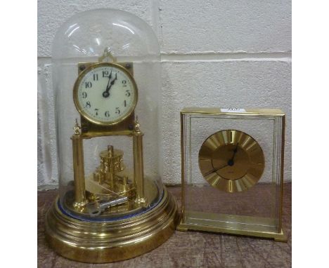 An anniversary clock and an Ernest Jones quartz mantel clock