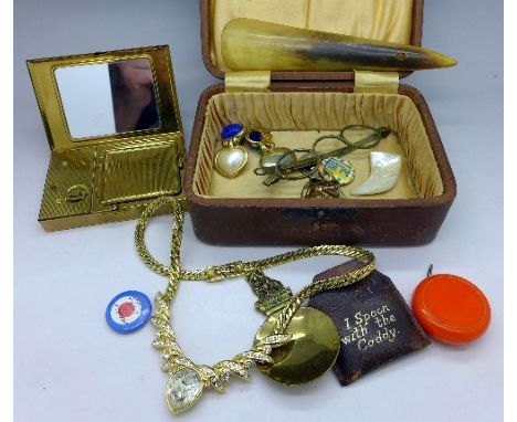 A musical compact, a necklet, etc.