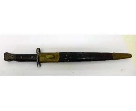 A British bayonet with scabbard, the blade marked Wilkinson, London, length 42cm