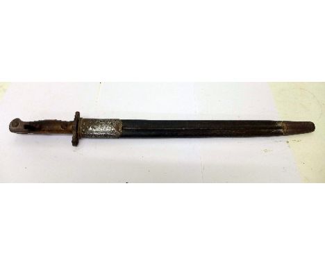 A George V British 1907 model bayonet with scabbard, length 55.5cm, the blade marked Sanderson