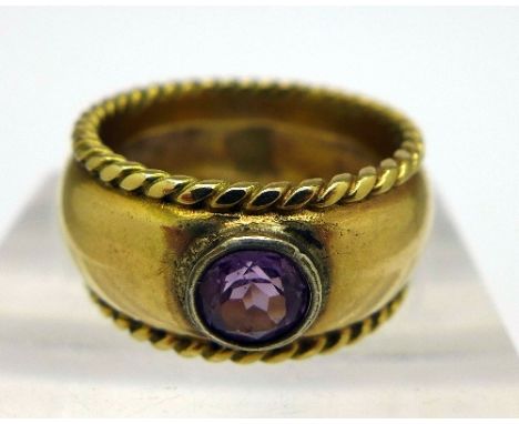 A 9ct gold and amethyst ring, weight 10.1g, size L