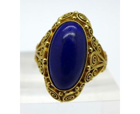 A 14ct gold and blue stone ring, weight 5.6g, size L