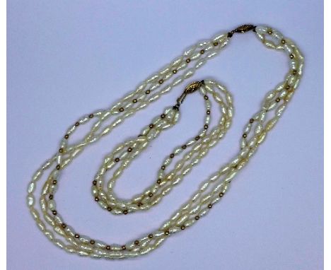 A 9ct gold mounted freshwater pearl necklace and bracelet set, both with 9ct gold clasps