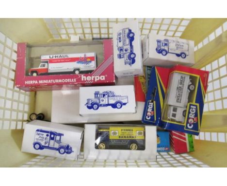 Fourteen small diecast vehicles by Lledo, Corgi and others including Readers Digest vintage cars, boxed E (Est. plus 21% prem