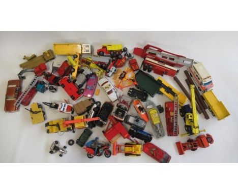 Playworn diecast vehicles by Matchbox, Corgi and others including fire engine, construction vehicles and cars (Est. plus 21% 